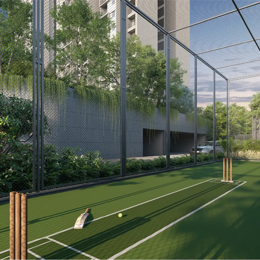 Orchid South Park by Goyal & Co., Electronic City, artistic impression A netted box-cricket court among trees below the towers of Orchid South Park